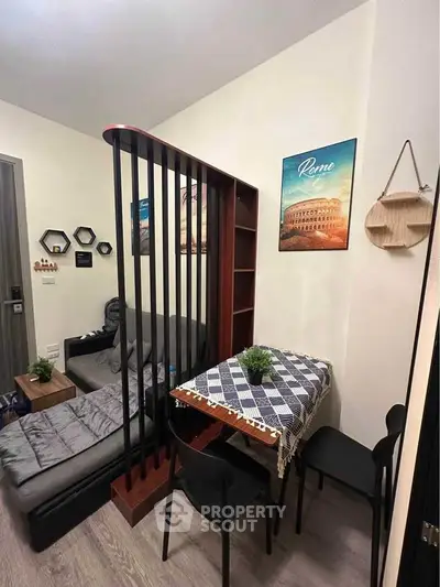 Cozy living room with modern decor and stylish dining area