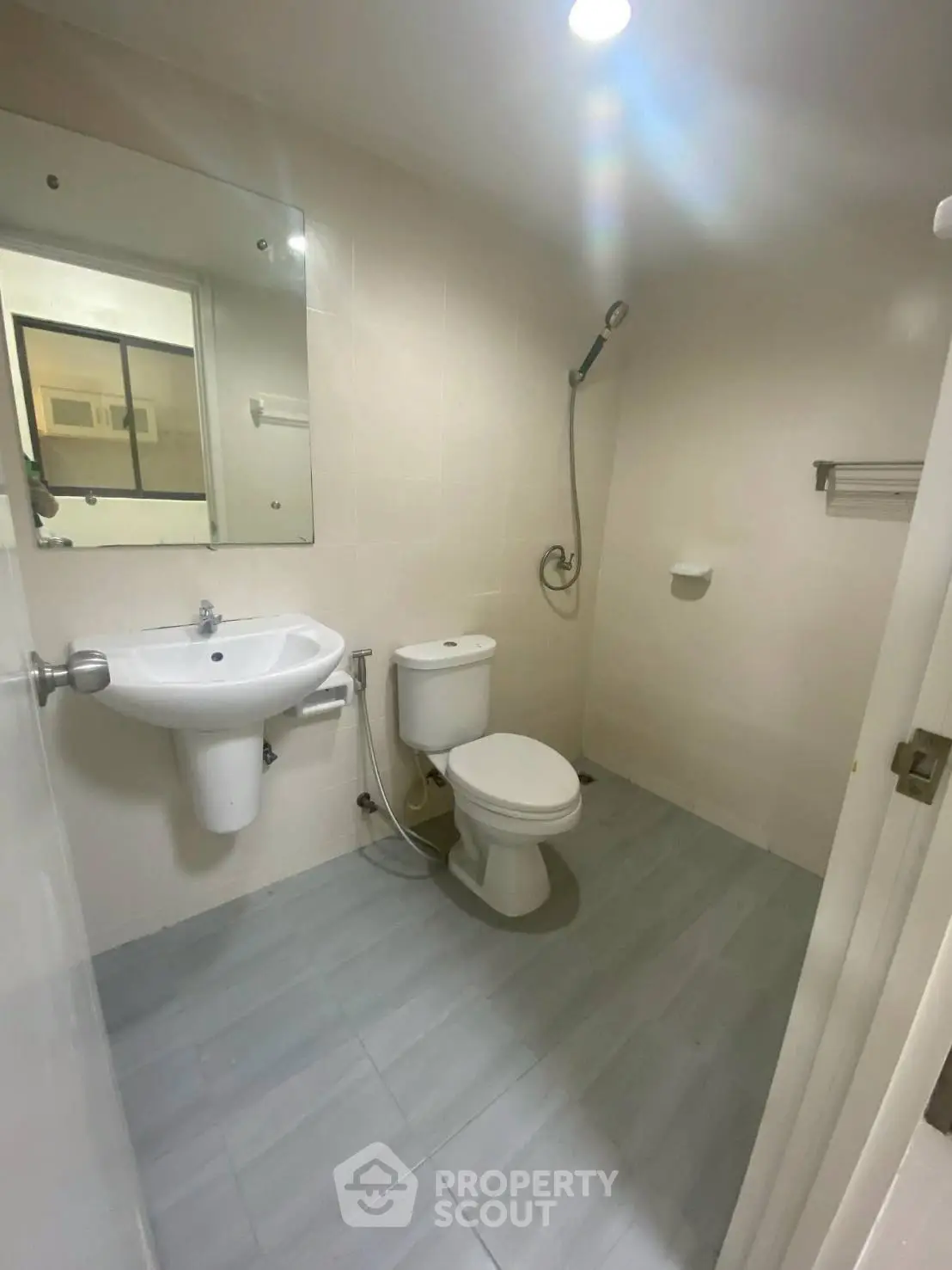 Modern minimalist bathroom with sleek fixtures and neutral tones