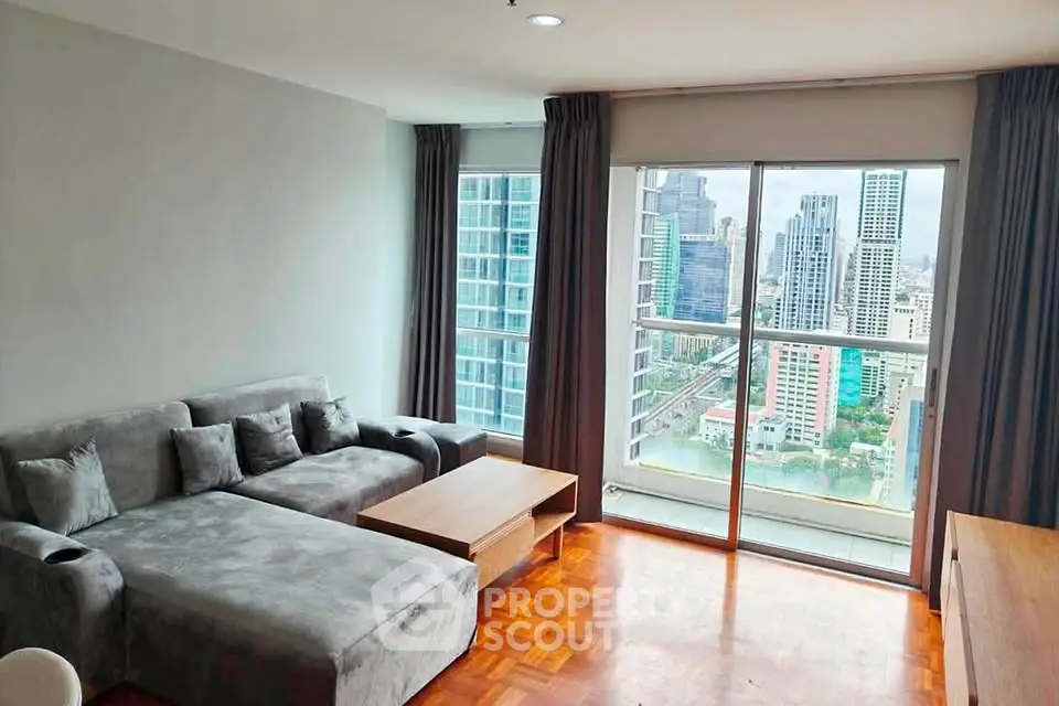 Modern living room with city view and stylish furniture