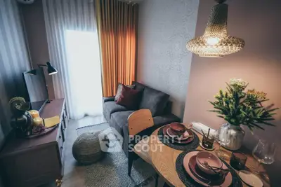 Cozy living room with stylish decor and dining area, perfect for modern living.