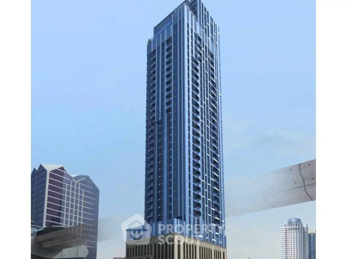 Stunning modern skyscraper with sleek design in urban skyline, perfect for luxury living or investment.