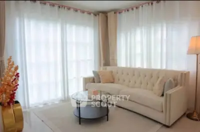 Elegant living room with plush sofa and modern decor