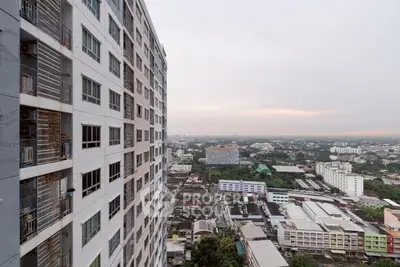 High-rise building with panoramic city view at sunset