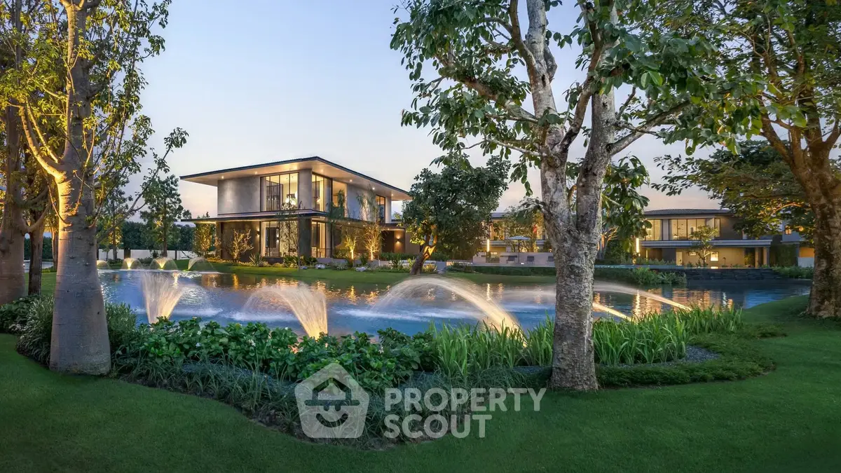 Luxurious modern villa with stunning garden and water feature, perfect for serene living.