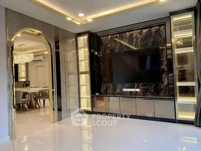 Luxurious modern living room with marble accents and built-in TV unit