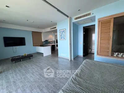 Spacious modern living room with open kitchen and stylish decor