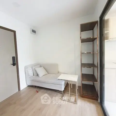 Cozy living room with modern furniture and open kitchen layout