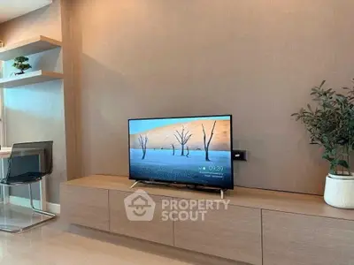 Modern living room with sleek TV unit and stylish decor