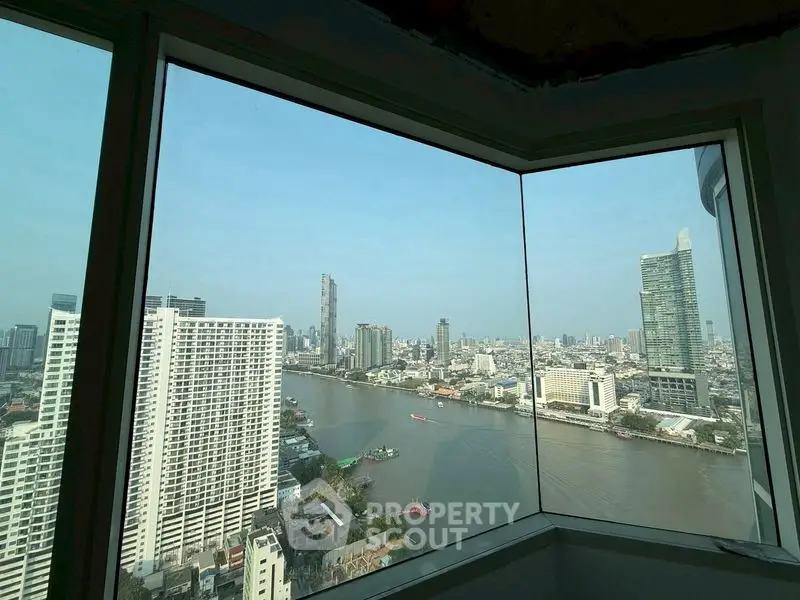 Stunning river and cityscape view from high-rise apartment window