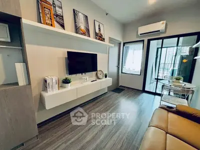 Modern living room with sleek design and city view balcony