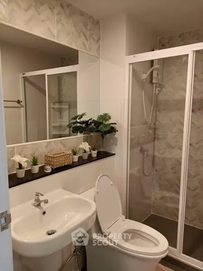 Modern bathroom with stylish shower and elegant decor