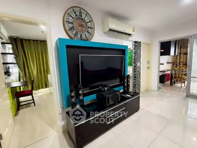 Modern living room with sleek entertainment center and air conditioning