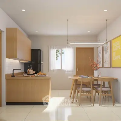 Modern kitchen and dining area with sleek wooden cabinetry and stylish decor