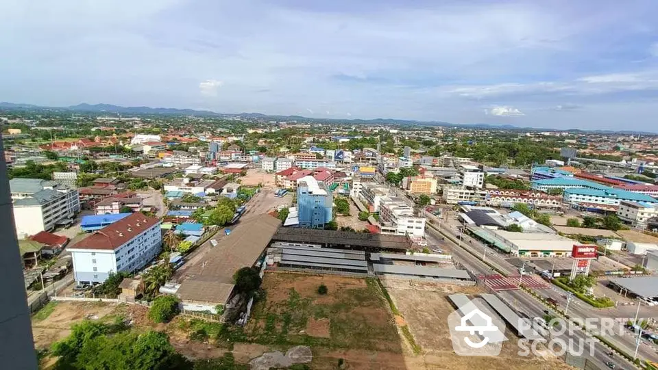 Stunning panoramic cityscape view from high-rise building balcony