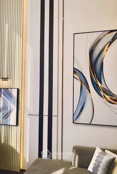 Modern living room with abstract art and stylish decor