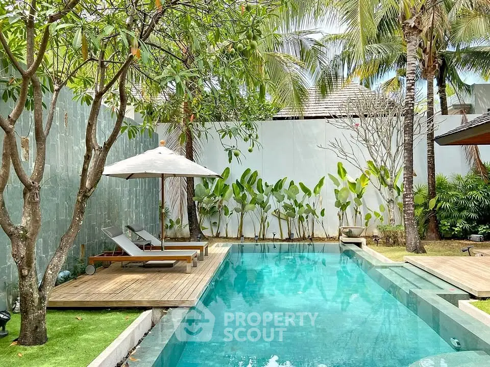 Luxurious tropical poolside oasis with lush greenery and elegant design, perfect for relaxation and entertainment.