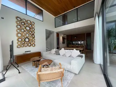 Luxurious modern living room with high ceilings and stylish decor