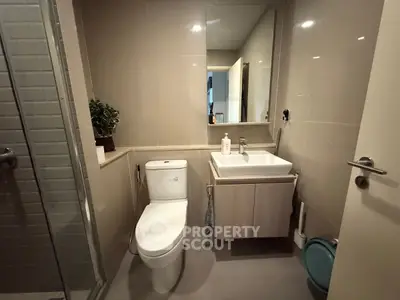 Modern bathroom with sleek fixtures and neutral tones