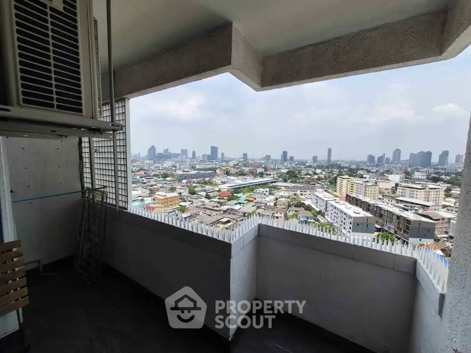 Stunning cityscape view from a high-rise balcony, perfect for urban living enthusiasts.