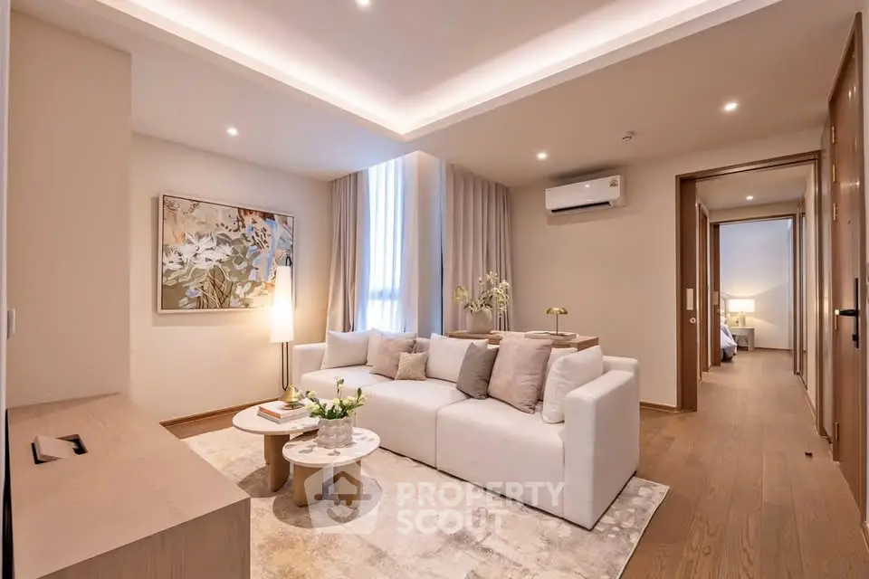 Luxurious living room with elegant decor and cozy ambiance in modern apartment.