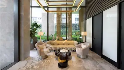 Luxurious living room with elegant modern furniture, marble floors, and sophisticated lighting fixtures, opening to a serene garden view.