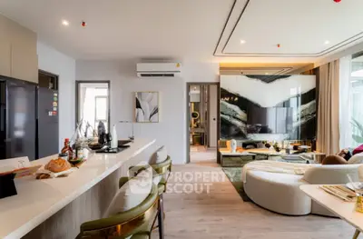 Luxurious open-plan living room with modern kitchen and stylish decor