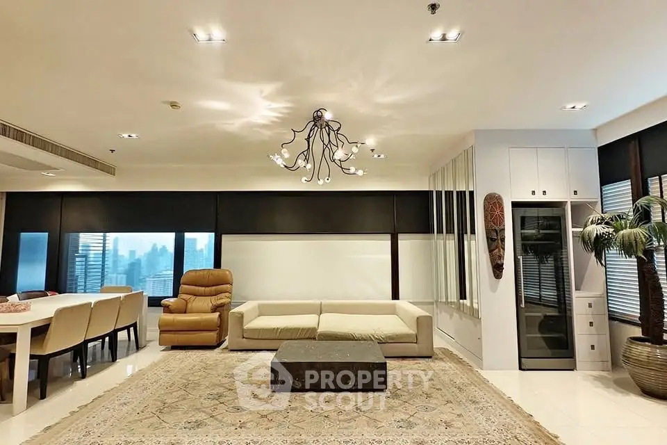 Luxurious modern living room with elegant chandelier and city view