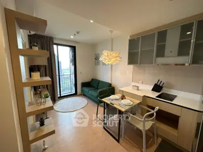 Modern living room with open kitchen and balcony view in stylish apartment