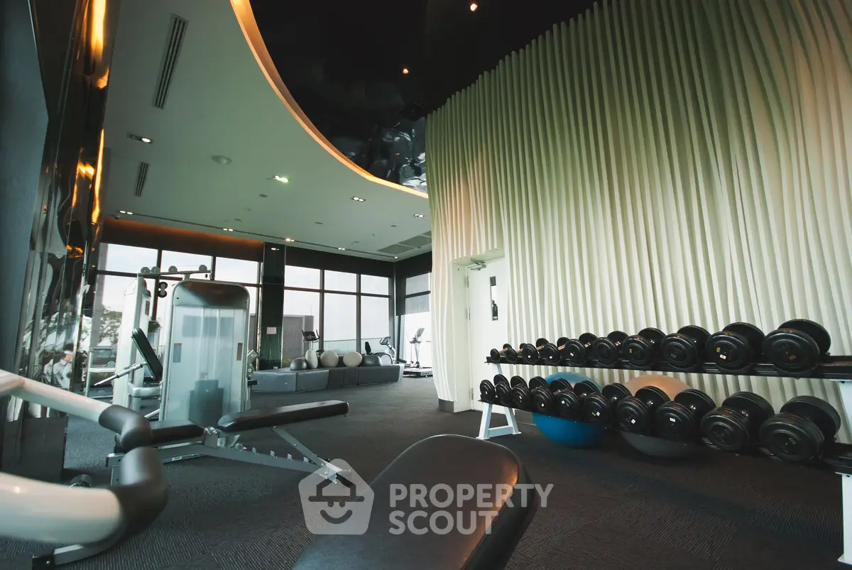 Luxurious modern gym with state-of-the-art equipment and sleek design