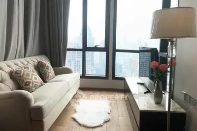 Chic urban living room with city view, cozy sofa, and stylish decor.