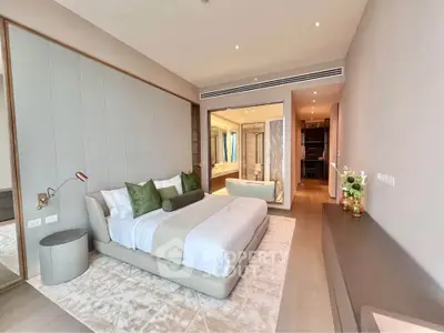 Luxurious modern bedroom with elegant decor and ensuite bathroom