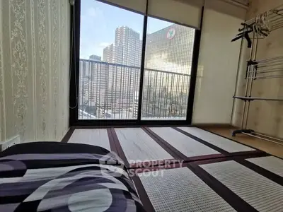 Modern apartment with tatami flooring and city view from large window