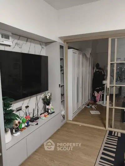 Modern living room with sleek TV setup and stylish decor
