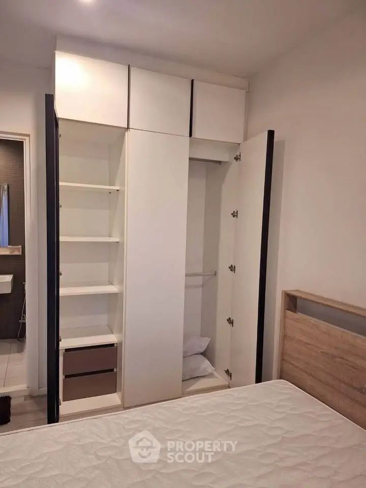 Spacious bedroom with built-in wardrobe and modern design