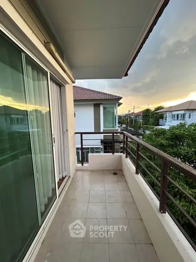 Spacious balcony with sunset view in modern residential area