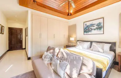 Luxurious bedroom with elegant decor and ample natural light