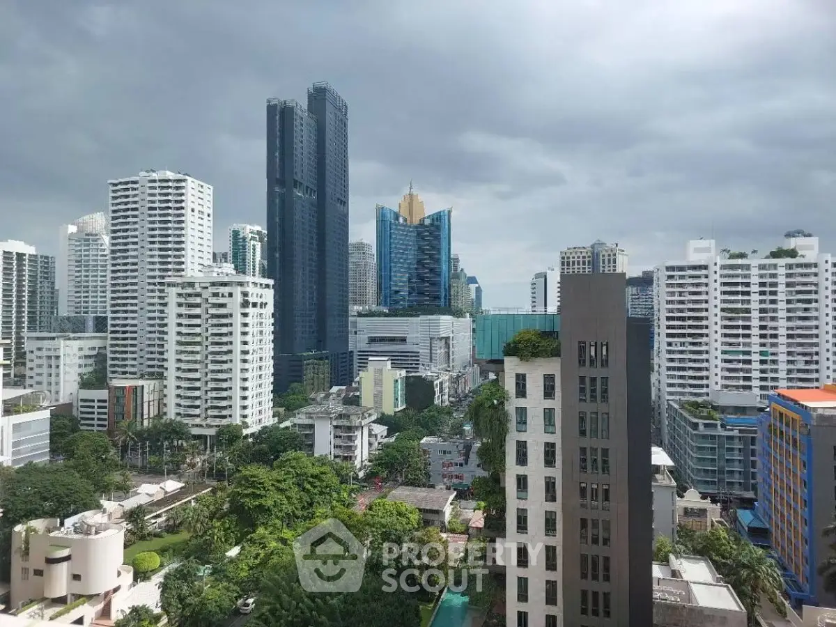 Stunning cityscape view showcasing modern skyscrapers and lush greenery, perfect for urban living enthusiasts.