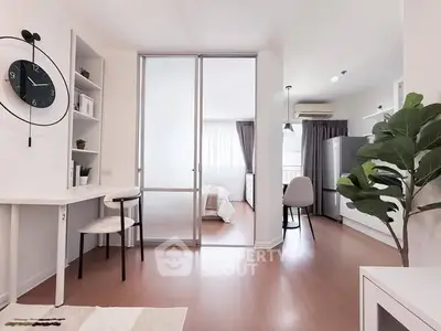 Modern open-plan apartment with stylish decor and natural light