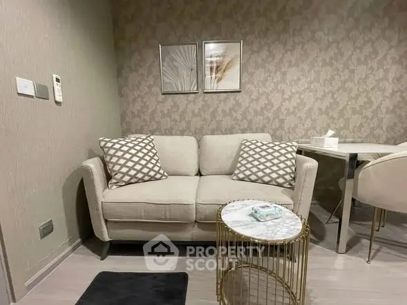 Stylish living room with elegant sofa and chic decor in modern apartment