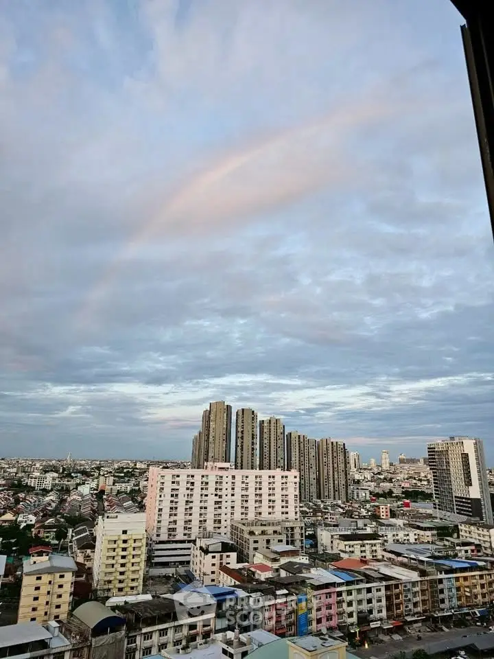 Stunning cityscape view with high-rise buildings under a vibrant sky.