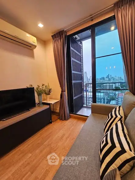 Modern living room with balcony view in urban apartment