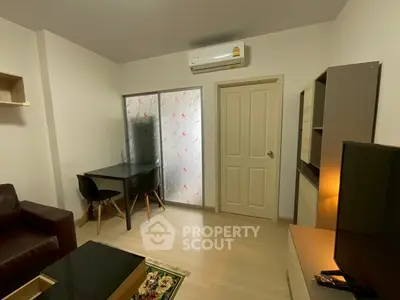 Cozy living room with modern furniture and air conditioning
