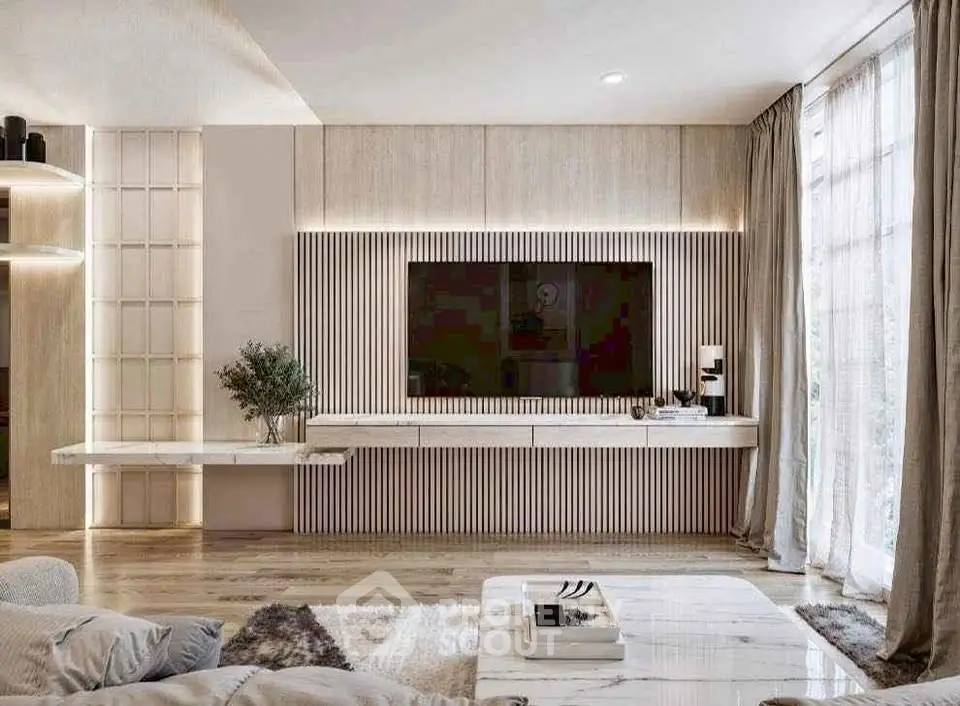Luxurious modern living room with sleek TV setup and elegant decor
