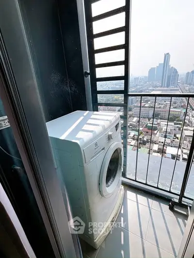 High-rise balcony with washing machine and stunning cityscape view