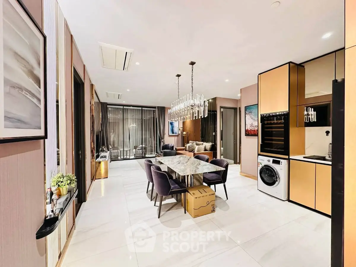 Luxurious modern living room with elegant dining area and built-in appliances, perfect for stylish urban living.