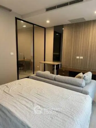 Modern bedroom with stylish decor and cozy ambiance