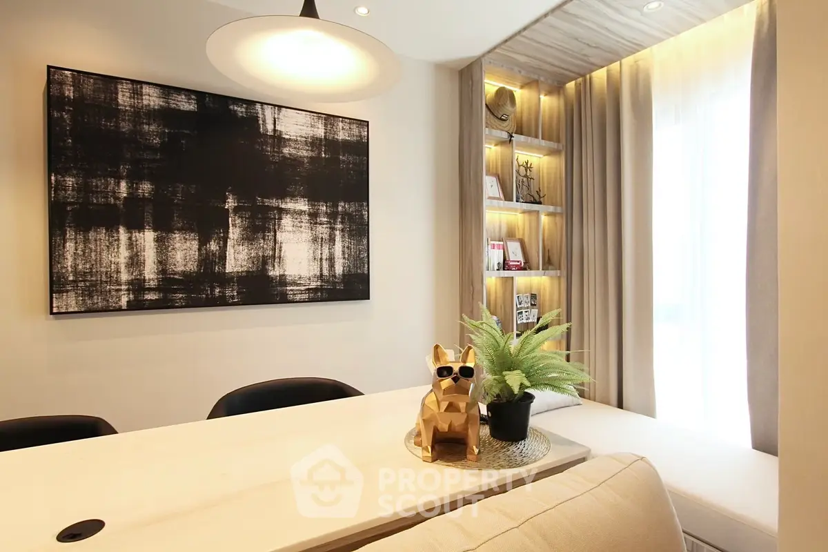 Stylish modern living room with abstract art and cozy seating area