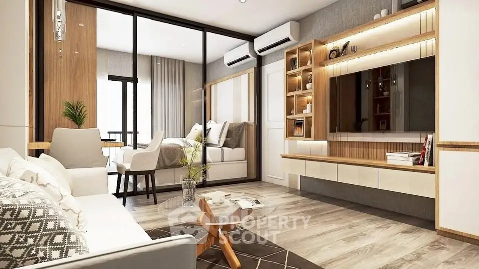 Modern living room with stylish decor and open layout, featuring a cozy seating area and elegant furnishings.