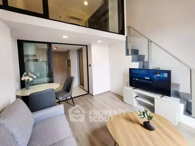 Modern duplex living room with stylish furniture and open layout