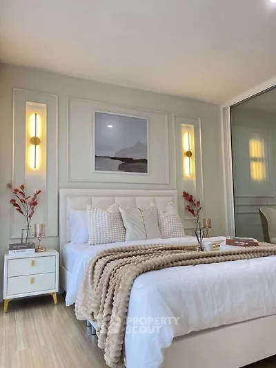 Elegant bedroom with modern decor and cozy ambiance